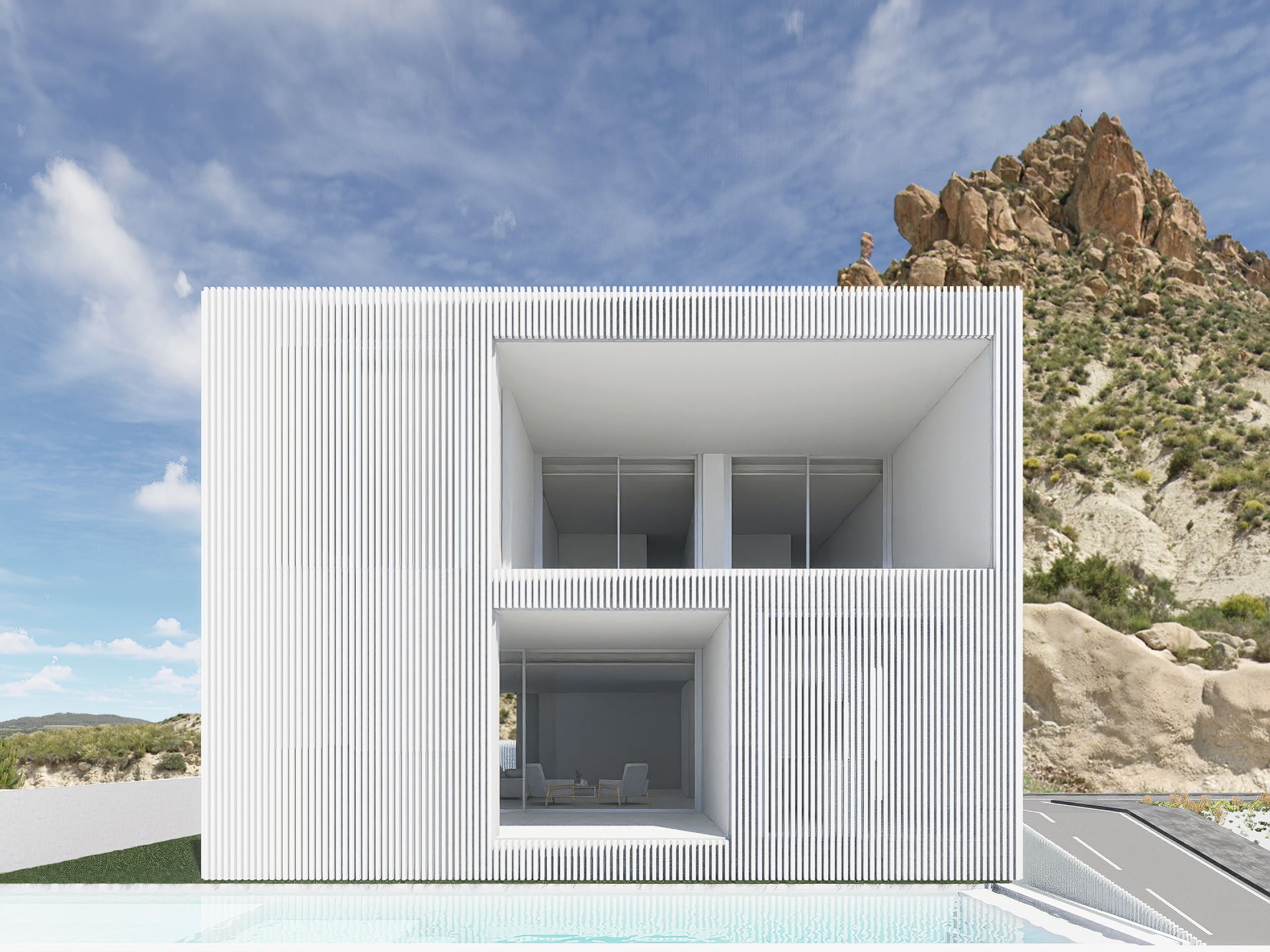 Fachada contemporánea de la Casa OPE, donde líneas puras y materiales nobles dialogan con el entorno natural.